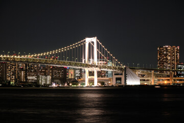 Fototapeta na wymiar A beautiful suspension bridge at night in Tokyo, Dec 2022