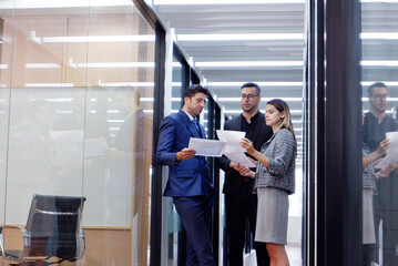 Business people discussing work in the office.