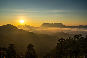 Majestic view of Doi Luang Chiang Dao in northern Thailand, the third highest mountain in Thailand, seen with beautiful dramatic clouds and colorful sky