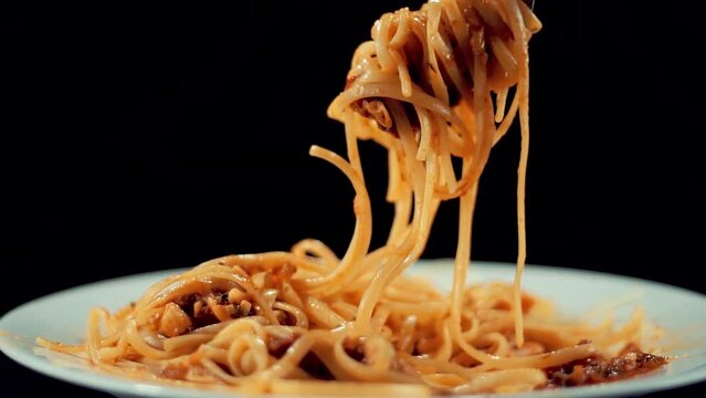 italian pasta bolognese . pasta with tomato sauce . italian food