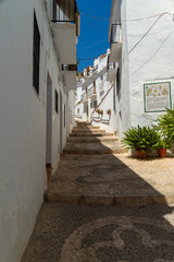 Typical narrow streets of Frigiliana, a village in Malaga.