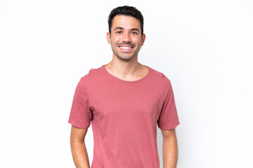 Young handsome man over isolated white background laughing