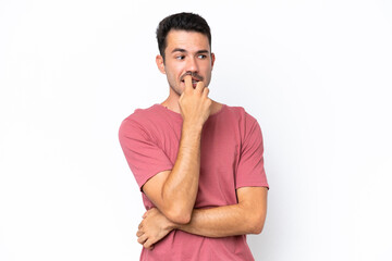 Fototapeta na wymiar Young handsome man over isolated white background nervous and scared