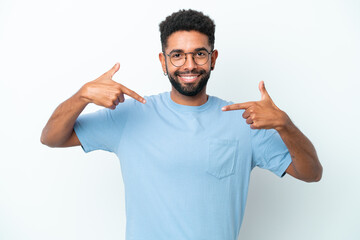 Fototapeta premium Young Brazilian man isolated on white background proud and self-satisfied