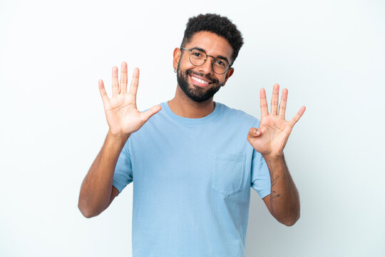 Young Brazilian man isolated on white background counting nine with fingers