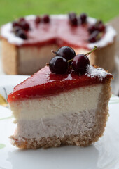 half a freshly baked cheesecake with berries