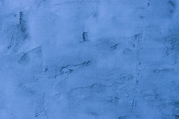 Texture of a blue putty wal.