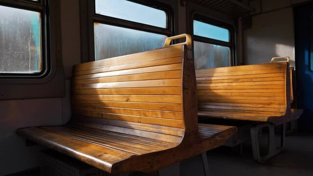Interior of old empty wagon of train without people, that rides in the forest