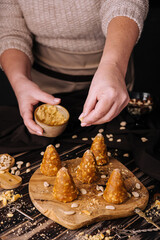 caramel cookies with walnuts on wooden board