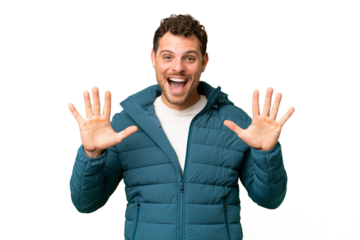 Brazilian man over isolated chroma key background counting ten with fingers