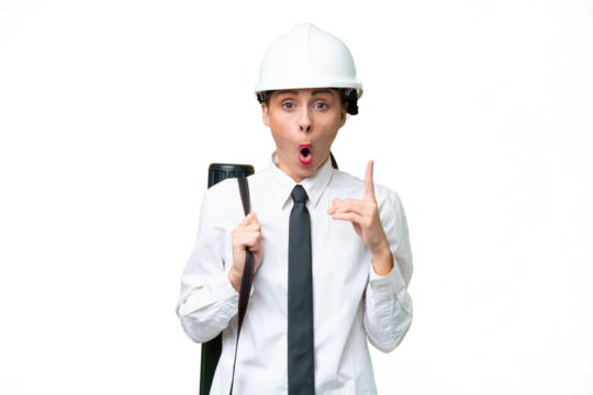 Young architect woman with helmet and holding blueprints over isolated background intending to realizes the solution while lifting a finger up