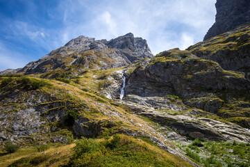 Fototapeta na wymiar Waterfall in Vanoise national Park valley, French alps