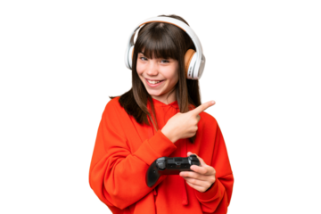 Little caucasian girl playing with a video game controller over isolated background pointing to the side to present a product
