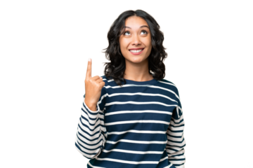 Young Argentinian woman over isolated background pointing up and surprised