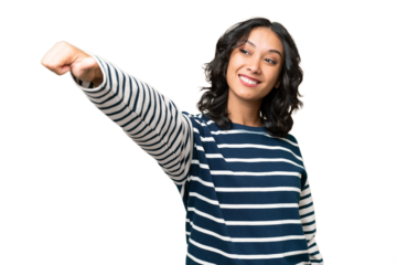 Young Argentinian woman over isolated background giving a thumbs up gesture