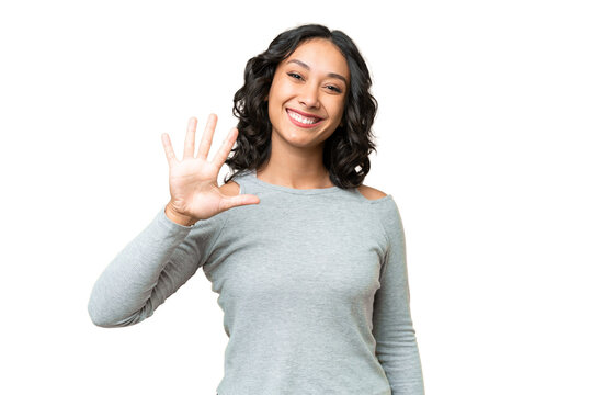 Young Argentinian woman over isolated background counting five with fingers