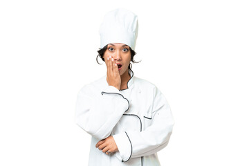 Young chef Argentinian woman over isolated background surprised and shocked while looking right