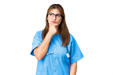 Middle age nurse woman over isolated background having doubts and with confuse face expression
