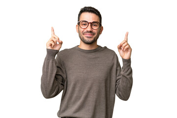 Young handsome caucasian man over isolated background pointing up a great idea
