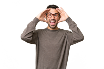 Young handsome caucasian man over isolated background with surprise expression