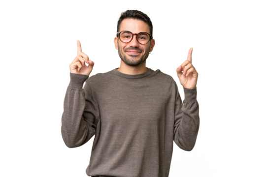 Young handsome caucasian man over isolated background pointing up a great idea