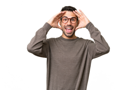 Young handsome caucasian man over isolated background with surprise expression