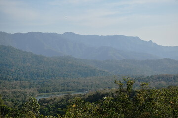 Naklejka premium landscape of tree in sunset on mountain at Thailand