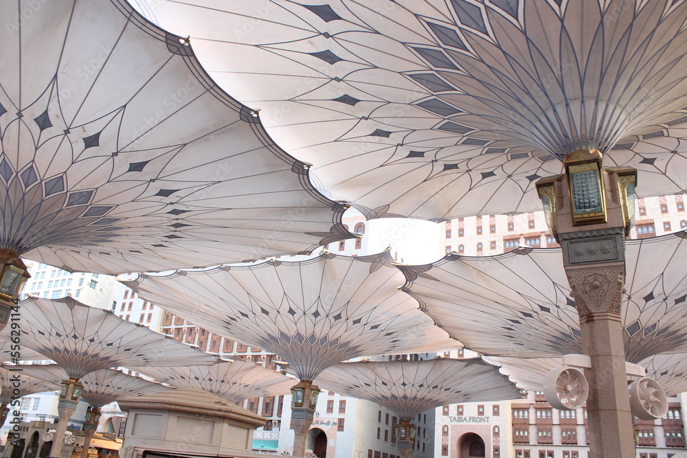 Wall mural umbrella construction in medina, mosque prophet mohammed