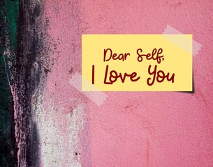 Stick note on pink grunge vintage wall with text written DEAR SELF, I LOVE YOU to build up self esteem, respect and acceptance, accept imperfection just the way it is than seeking approval from others