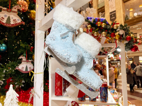 Moscow, Russia, December, 04, 2022. Toy skates among gifts and souvenirs for the New Year in the central store "Detsky Mir" on Lubyanka. Moscow