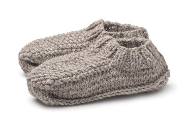 Fototapeta na wymiar Pair of gray woolen knitted slipper socks