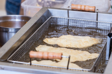 street fast food in the caucasus, fried flour product in oil