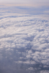 Fototapeta premium Beautiful cloud, blue sky at sunset. Air travel, adventure. Poster