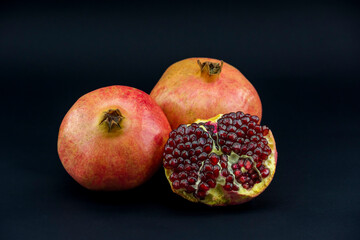 Fototapeta na wymiar pomegranate on a black background