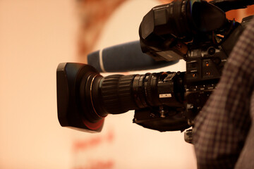Fototapeta na wymiar TV camera with microphone on set