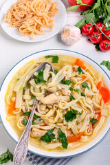 Chicken soup with homemade noodles.