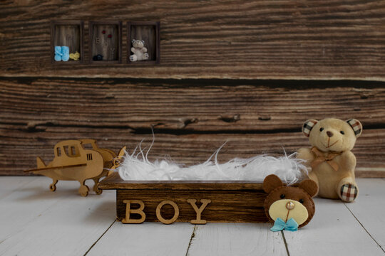 Newborn digital backdrop with teddy bear, plane, word boy and wooden box. Newborn background.  Front view.
