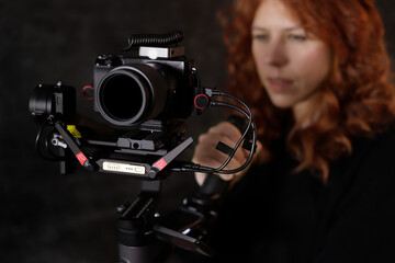 woman with camera and gimbal in closeup