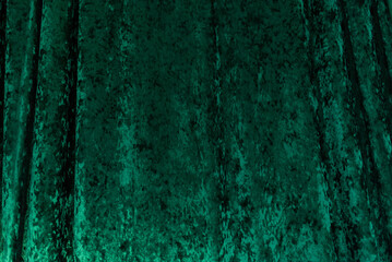 Green curtain of luxurious velvet on the theater stage. abstract background.
