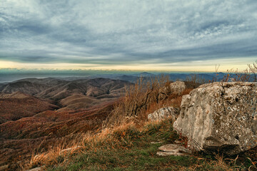 View from Mount Peus, a mountain peak in the Northwestern Caucasus. View from a height of 1000 m on the mountain peaks of the Black Sea coast of the Caucasus.