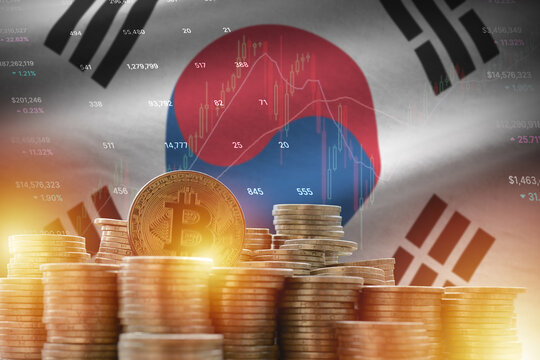 South Korea flag and big amount of golden bitcoin coins and trading platform chart. Crypto currency concept