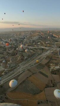 fly in a hot air balloon in Cappadocia in the morning at sunrise