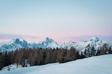 winter mountain landscape on sunset