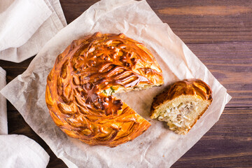 Sliced savory pie with chicken, potatoes and rice. Homemade pastries. Top view. Closeup © elenarui