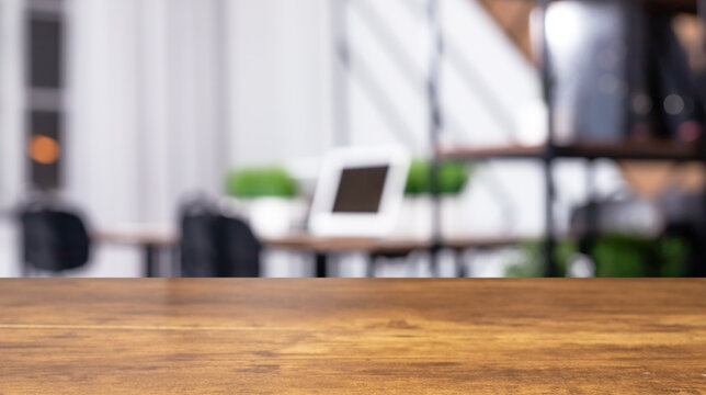 Blurred office background, work space interior with focused wood desk, wooden table. High quality photo