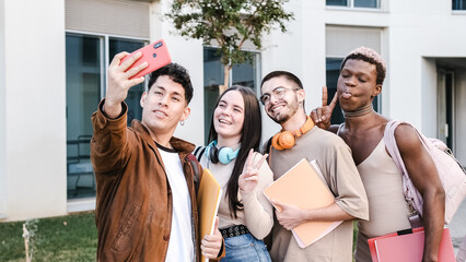 Diverse students taking selfie together