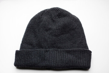 black winter hat. black hat isolated on white background. leather texture. close up of texture. pattern texture. textile texture closeup. textile materials. pattern surface. gray cloth. fabric design.