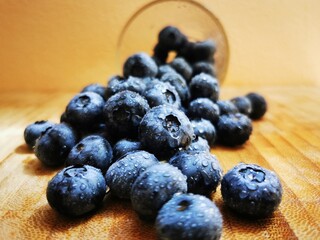 Fresh Blueberry fruits. Drops of water on organic blueberry