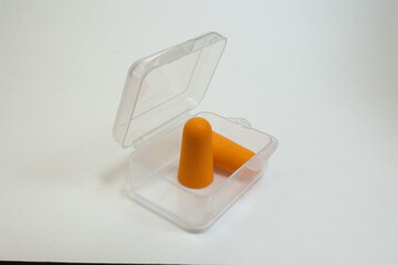 Silicone ear plugs for human ears on white background