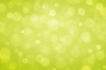 Light green bokeh with a small tint of white background.   New Year, Christmas and all celebration backgrounds concepts.